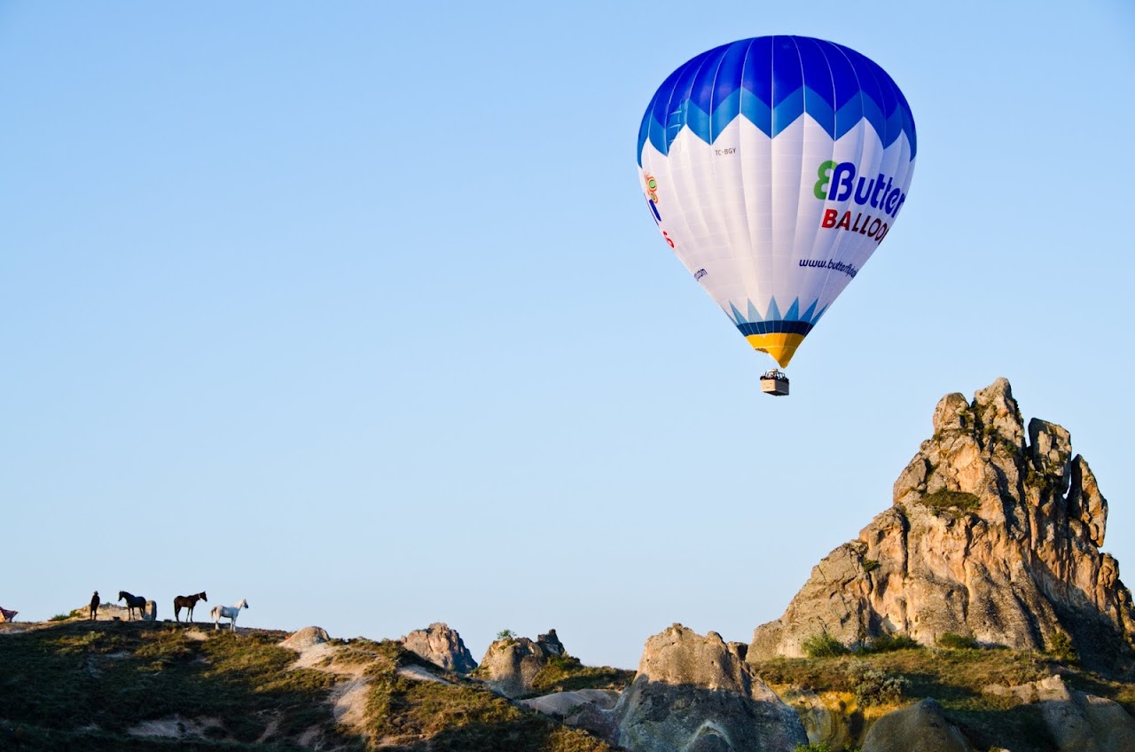 Hot air balloon with horses in Cappadocia