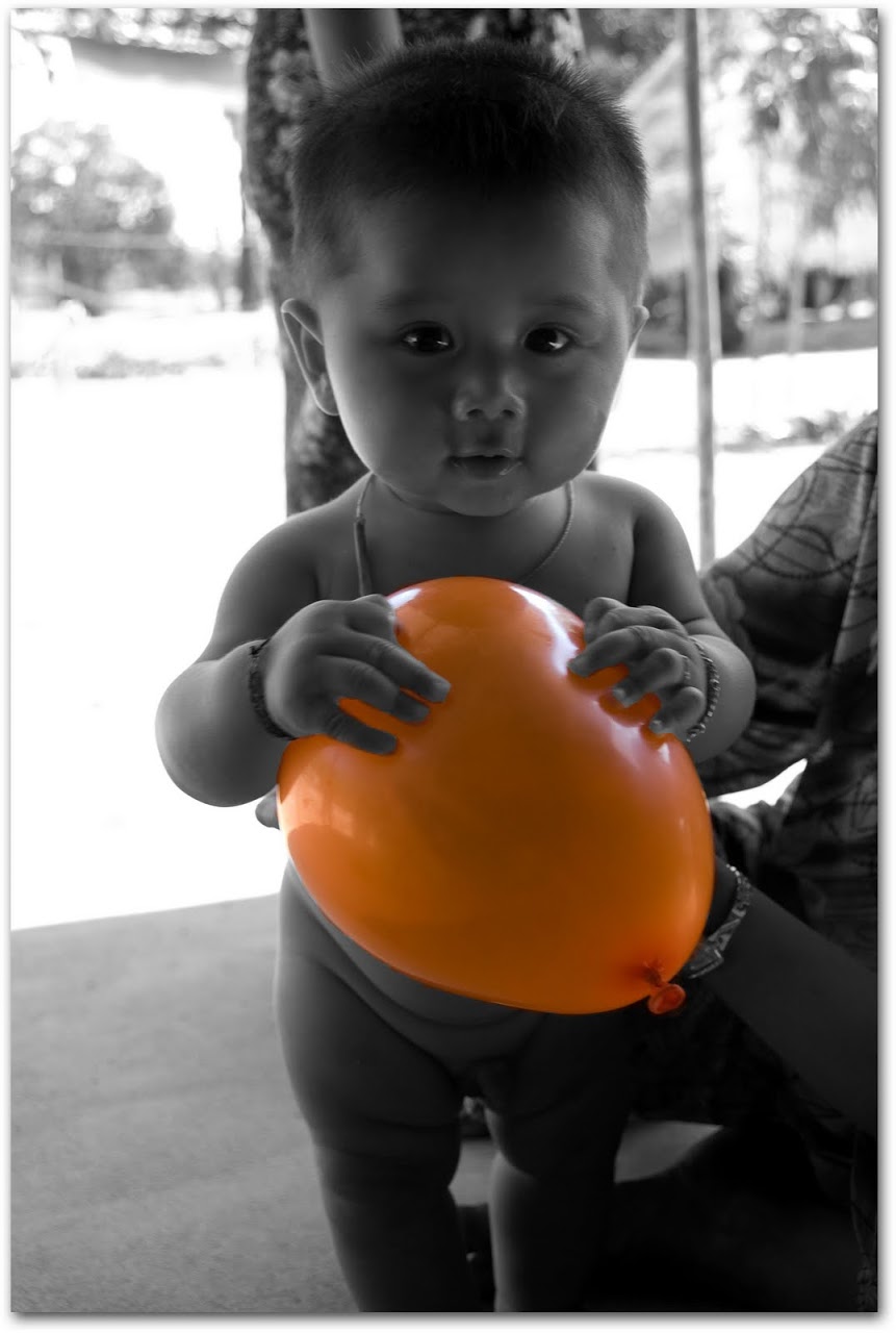 Baby with balloon