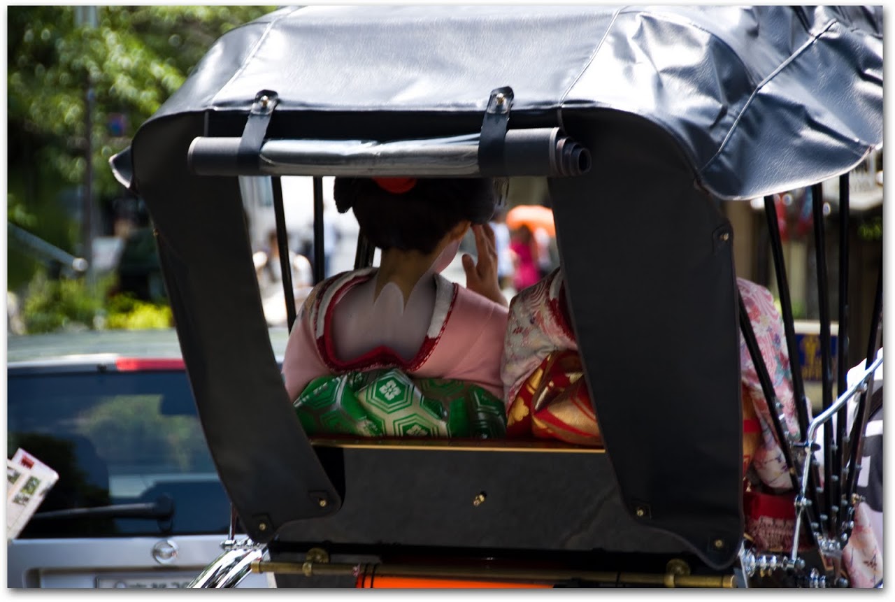 Geisha in rickshaw