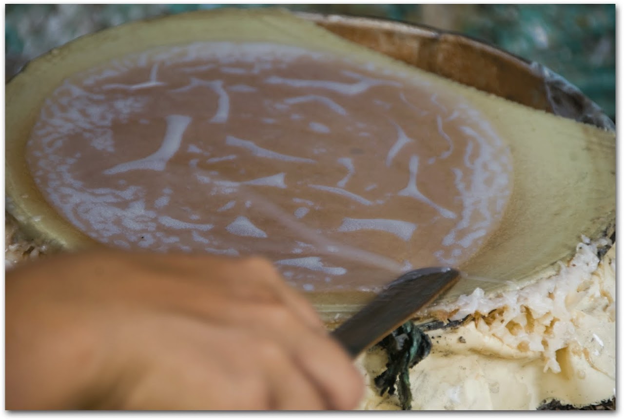 Rice paper roll liquid being cooked on pan