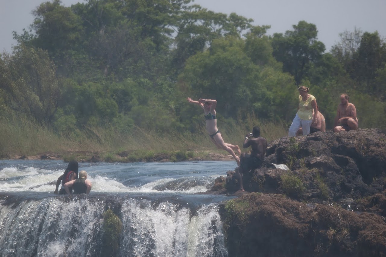 Jumping into Victoria Falls infinity pool