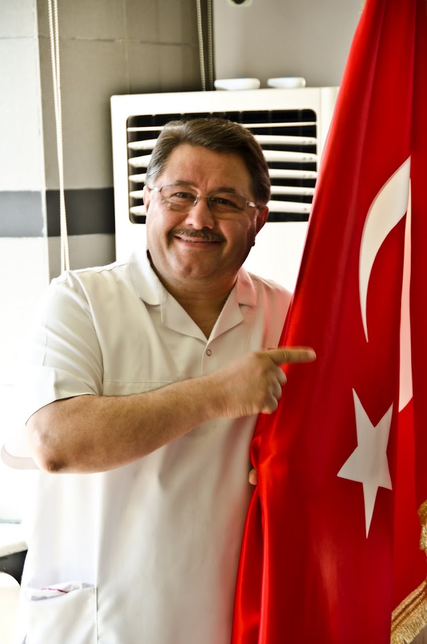 Nadir Gulluoglu with Turkish flag